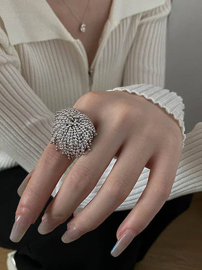 Geometric Tasseled Rings