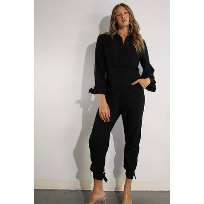RUFFLE LONG SLEEVE JUMPSUIT