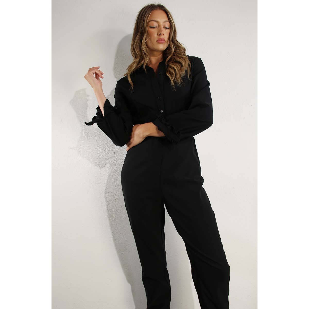 RUFFLE LONG SLEEVE JUMPSUIT