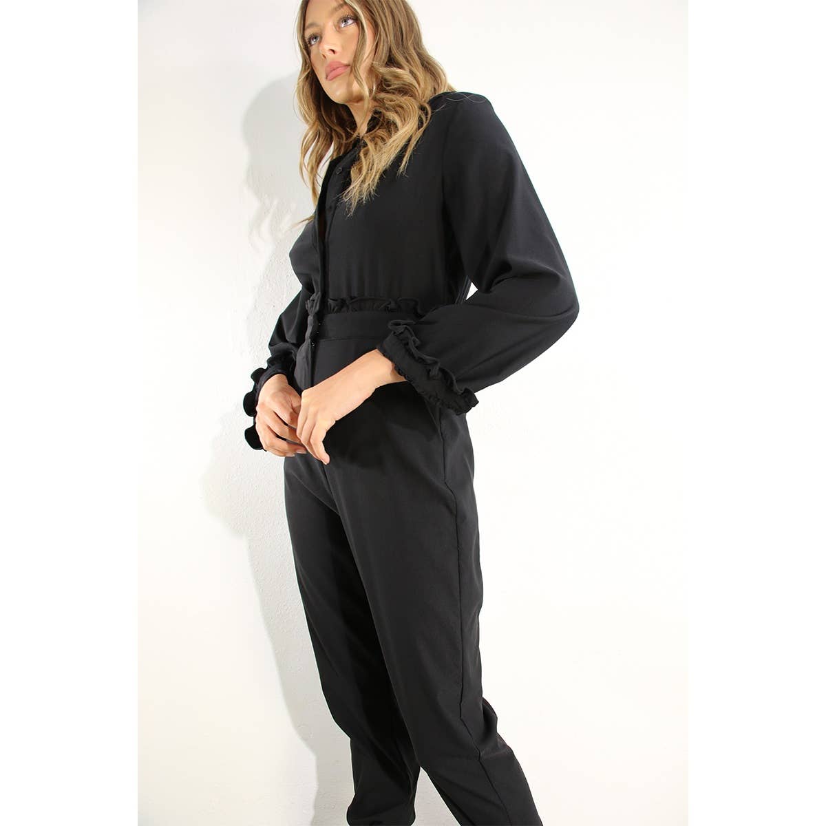 RUFFLE LONG SLEEVE JUMPSUIT