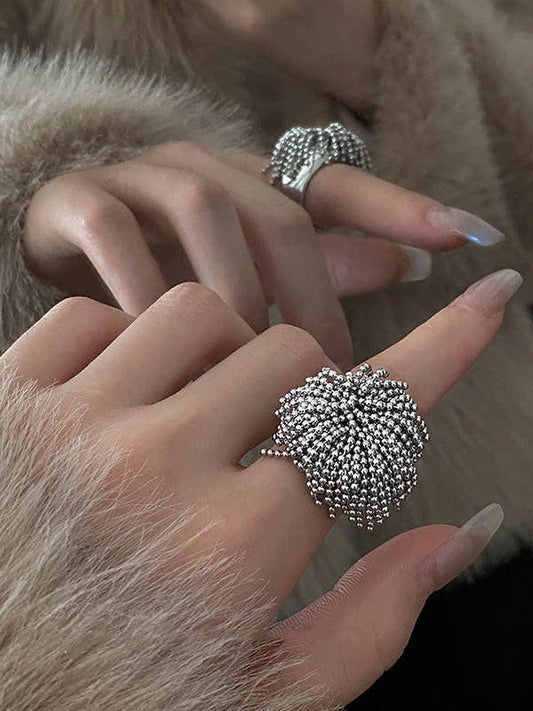 Geometric Tasseled Rings